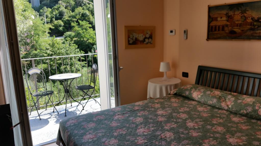 I Tecci Panzió Quiliano Szoba fotó